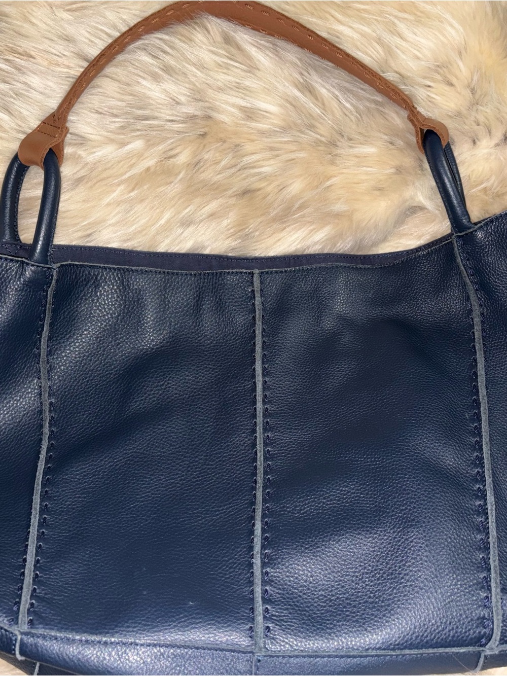 The Sak Navy Leather Shoulder Bag with Brown Handles